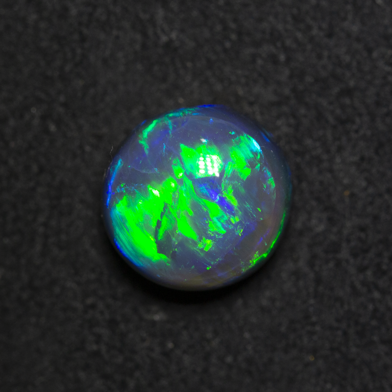 2.92 ct black opal gem 8.7x8.4x6.5mm