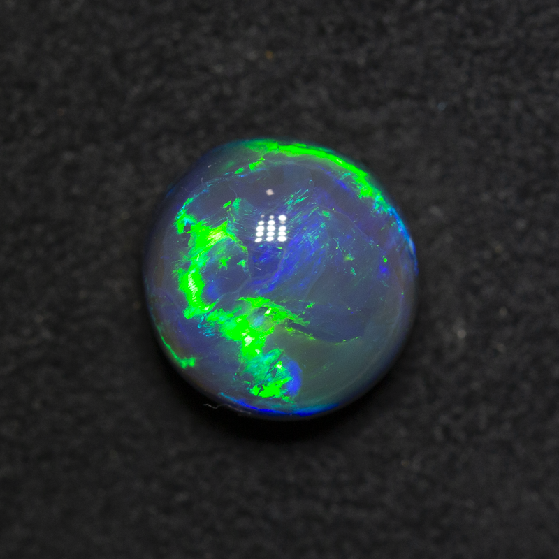 2.92 ct black opal gem 8.7x8.4x6.5mm