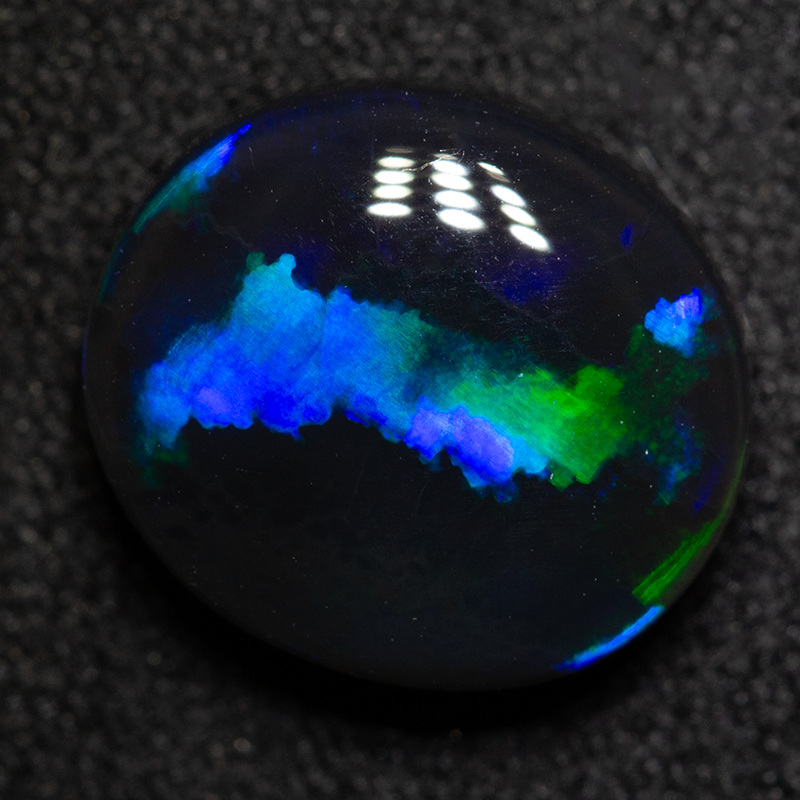 2.94 ct black opal 10.7x9.5x4.6mm