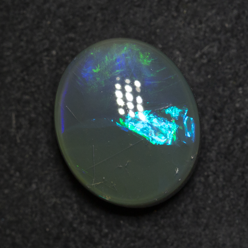 2.97 ct black opal 10.5x8.8x5mm