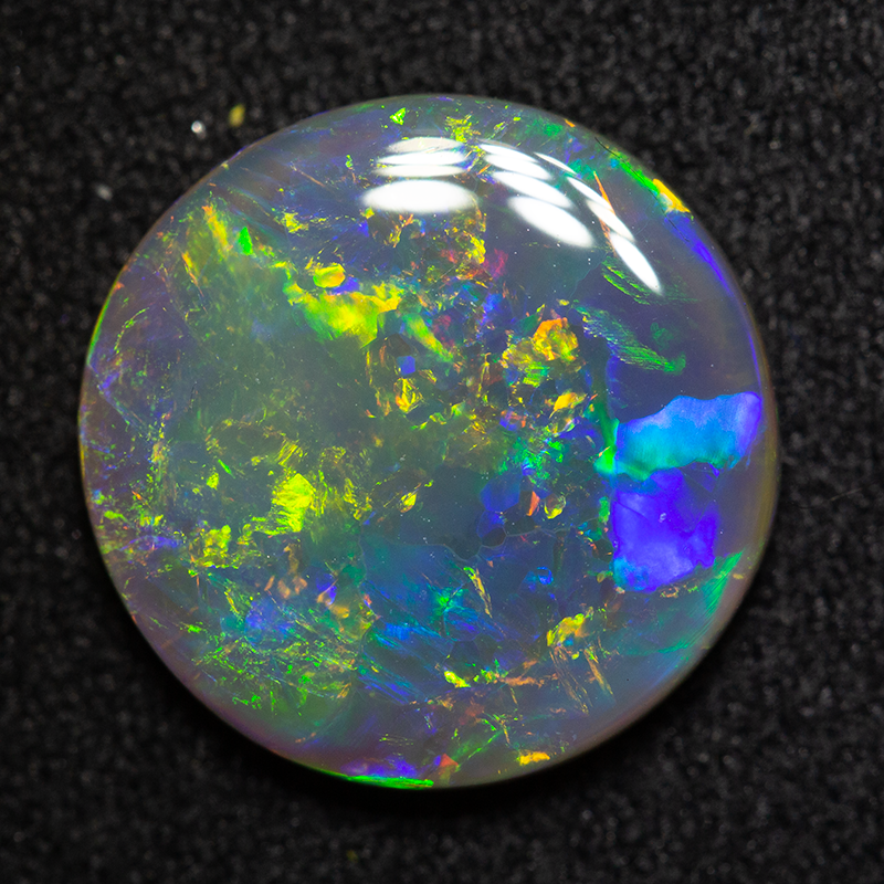 2.99 ct dark opal 12.5mm round x3mm