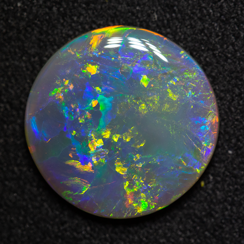 2.99 ct dark opal 12.5mm round x3mm