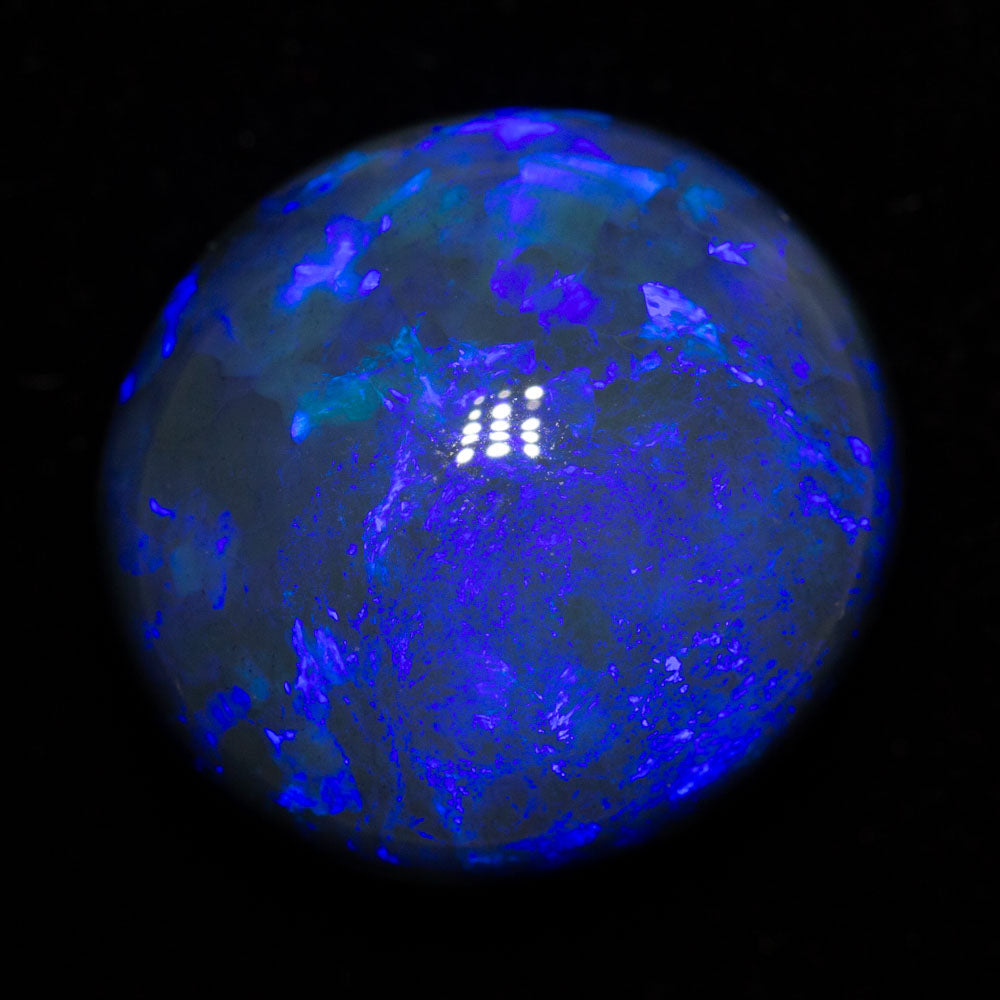 20.41 ct black opal 18.4x16.9x11.4mm