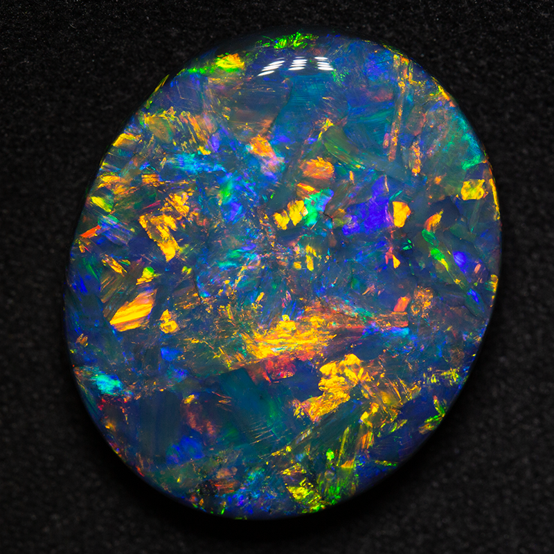 21.47 ct gem black opal 22.4x18.9x7.4mm