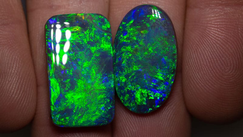 24.00 carats of gem black opal to a pair