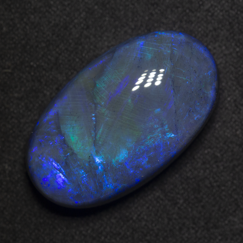 27.52 ct black opal 27x15.5x10.3mm