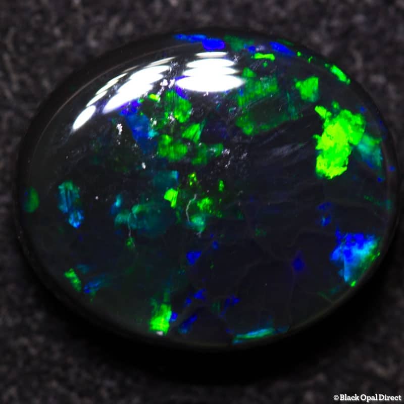 3.05 ct black opal 11x9x4mm