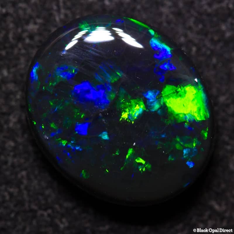 3.05 ct black opal 11x9x4mm