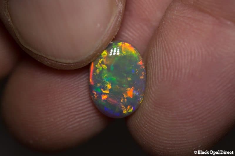 3.05 ct dark opal 12x9x4mm