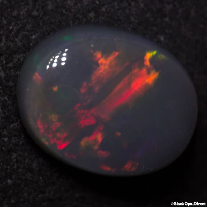 3.15 ct black opal 11x9x4mm