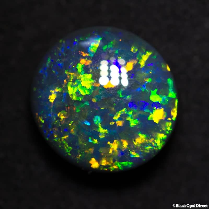 3.16 ct 10mm round black opal x 5mm thick