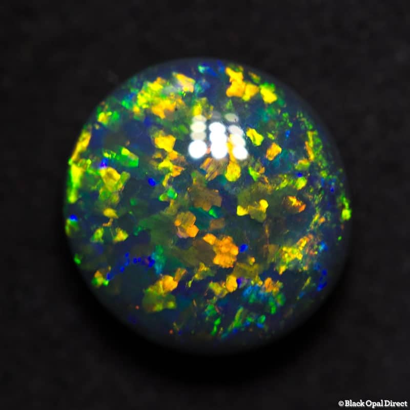 3.16 ct 10mm round black opal x 5mm thick