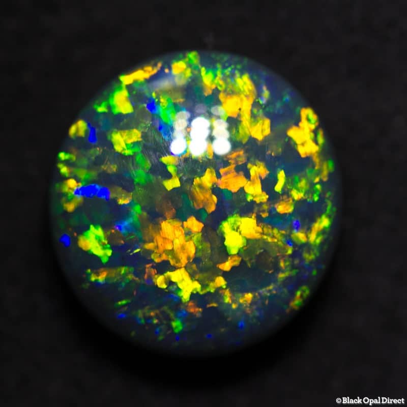 3.16 ct 10mm round black opal x 5mm thick