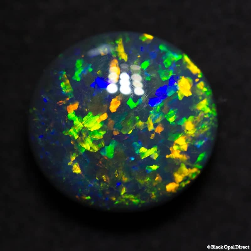 3.16 ct 10mm round black opal x 5mm thick