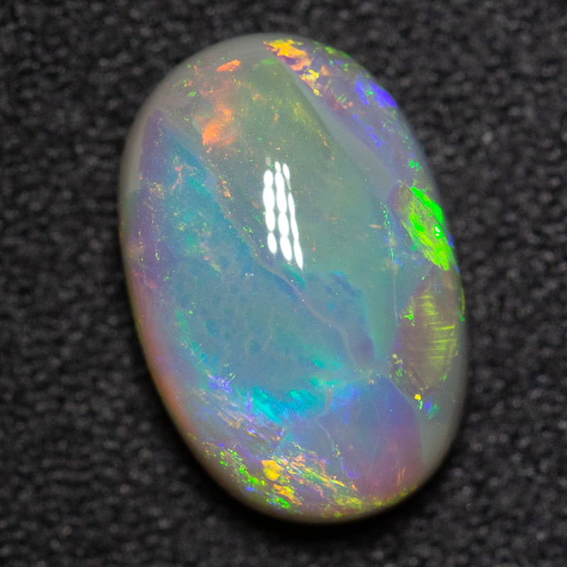 3.29 ct dark opal 12.1x8x4.9mm