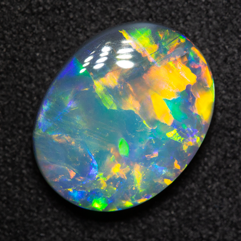 3.31 ct black opal 12.7x10.1x4.1mm
