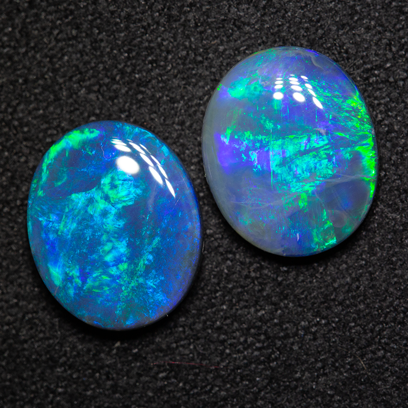 3.35 ct black opal pair 10x8.4x3.2mm
