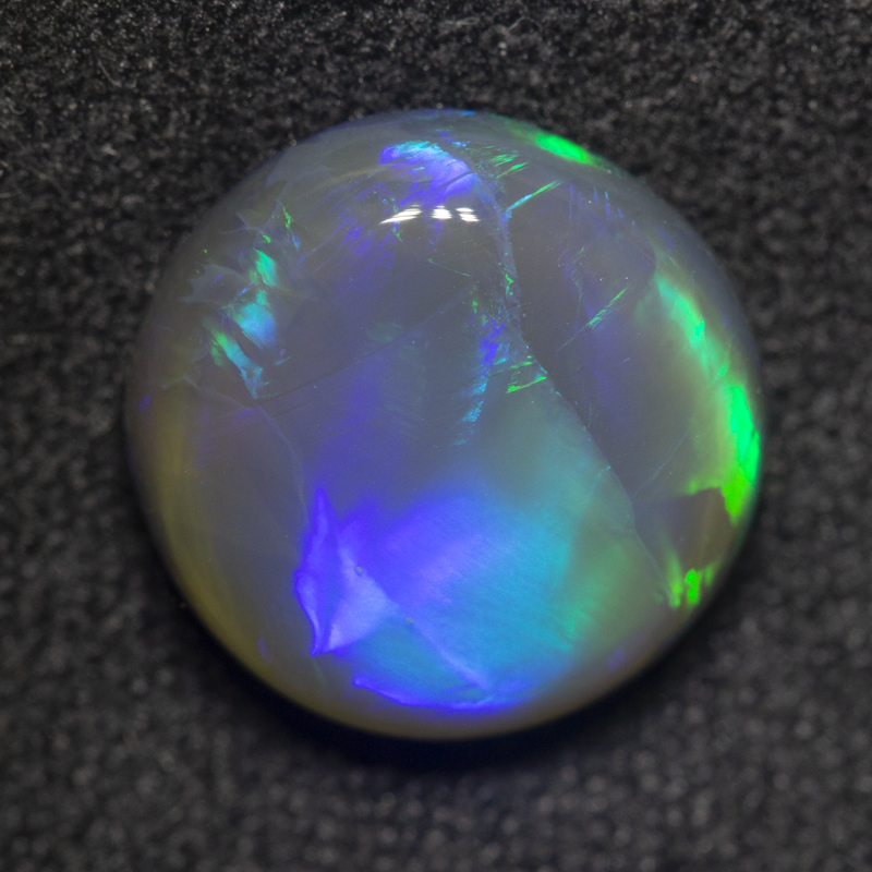 3.41 ct black opal 11x10.9x4.4mm