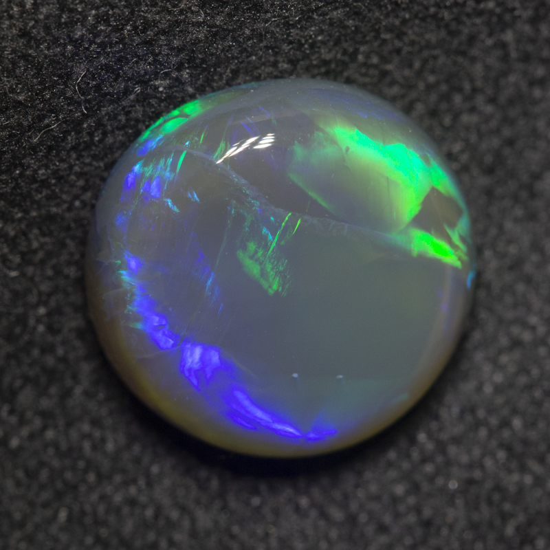 3.41 ct black opal 11x10.9x4.4mm