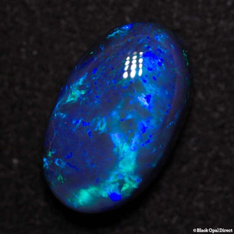 3.42 ct black opal 12x7.5x5mm