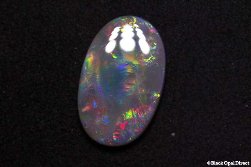 3.46 ct semi black opal 15x9.5x3mm