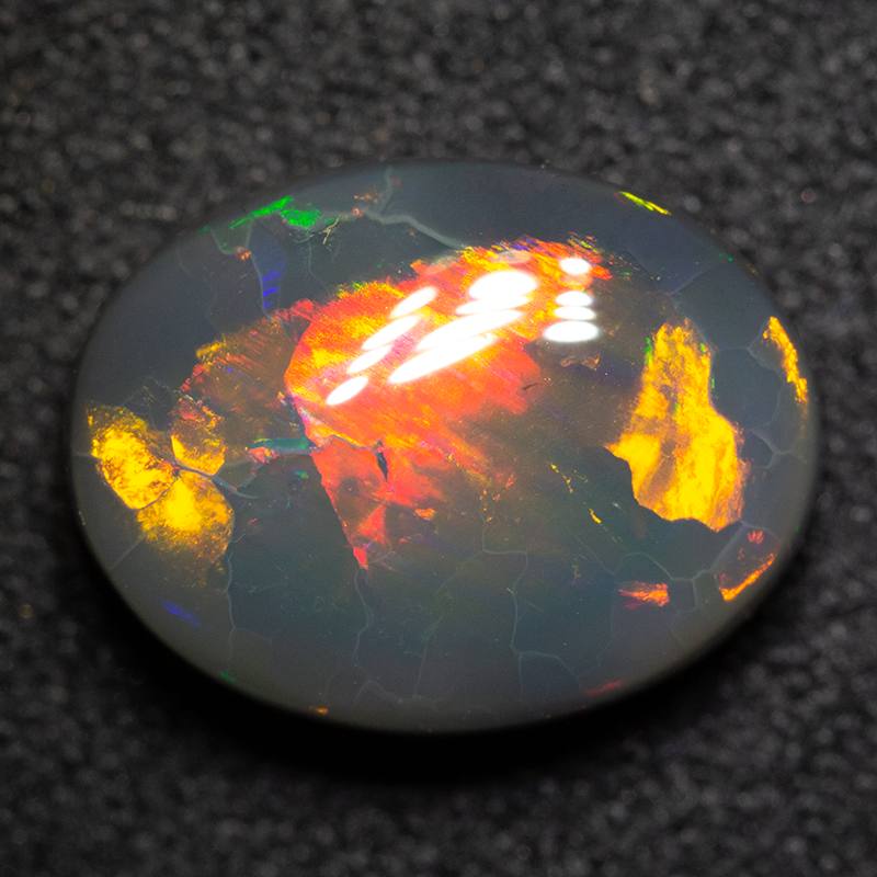 3.53 ct black opal 11.8x9.2x5.1mm