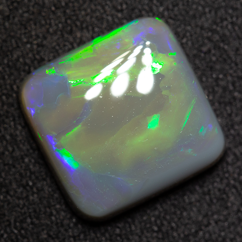 3.56 ct dark opal 11.1x10.8x3.6mm