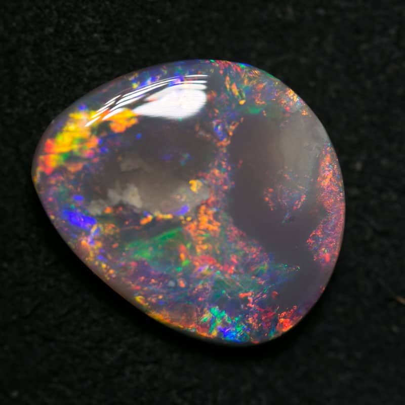3.58 ct dark opal 131x11x4mm
