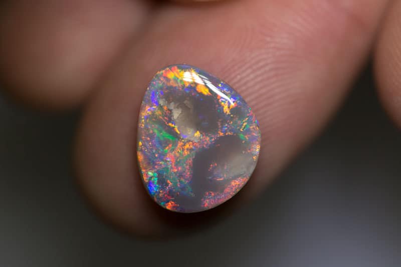 3.58 ct dark opal 131x11x4mm