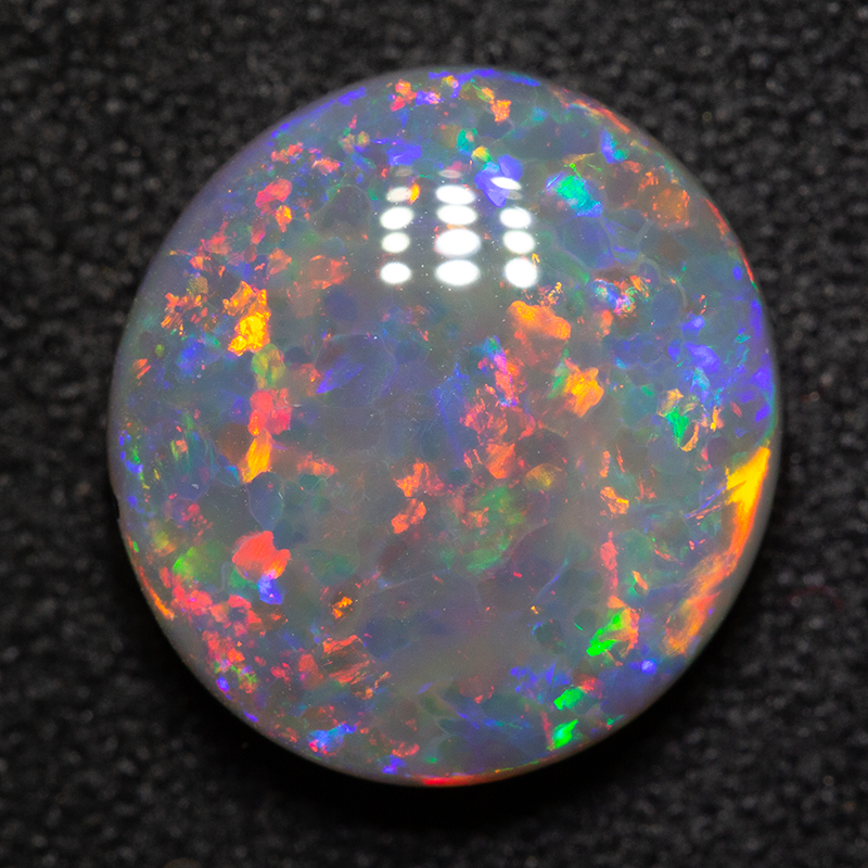 3.63 ct double-sided black opal 11.6x10.8x4.6mm