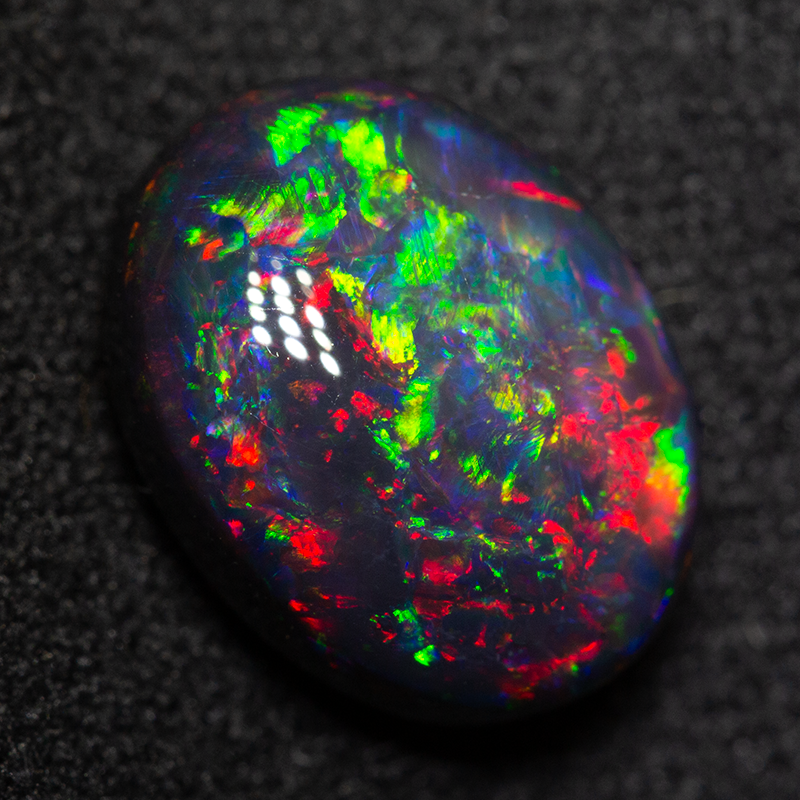 3.68 ct black opal 11.4x8.7x5.9mm