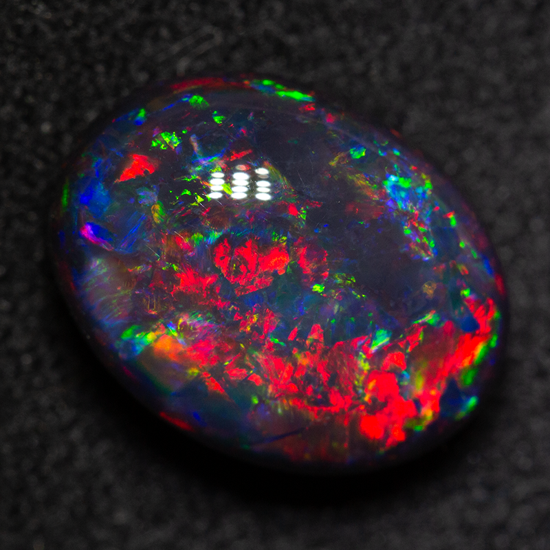 3.68 ct black opal 11.4x8.7x5.9mm