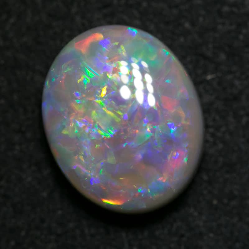 3.68 ct dark opal 12x10x4.5mm