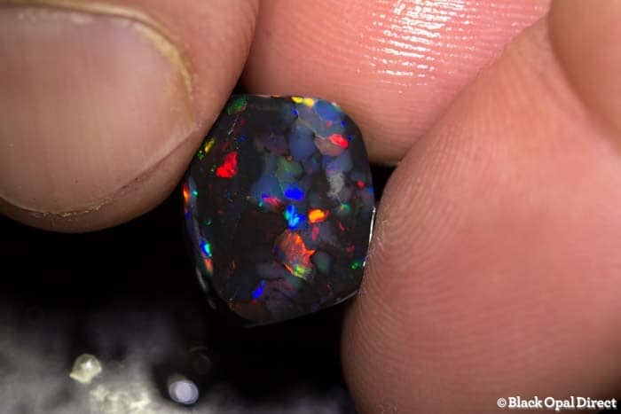 3.76 ct black opal rub 13mm across