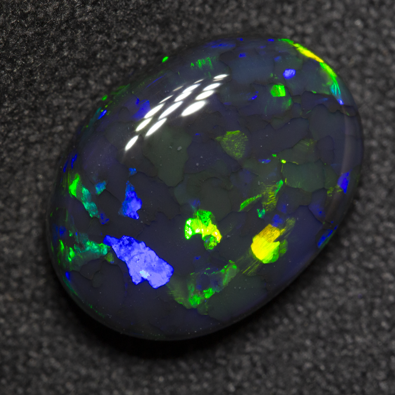 3.84 ct black opal 12.7x9.5x4.9mm