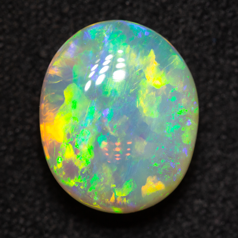 3.85 ct double-sided crystal opal 11.1x9.2x5.6mm