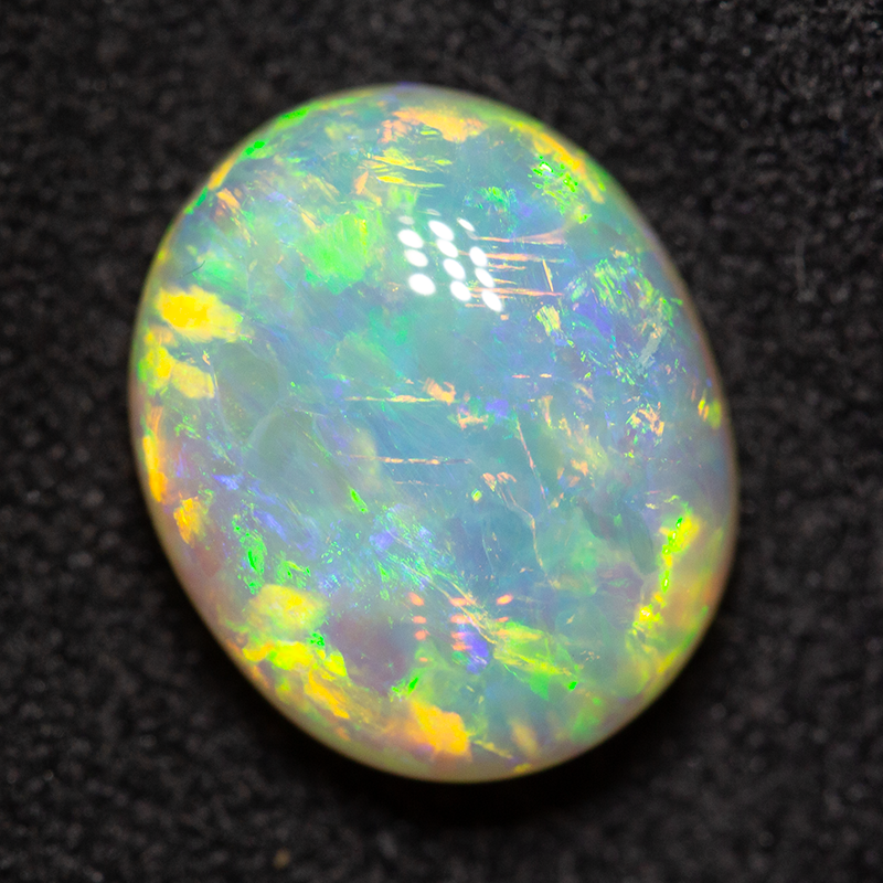 3.85 ct double-sided crystal opal 11.1x9.2x5.6mm