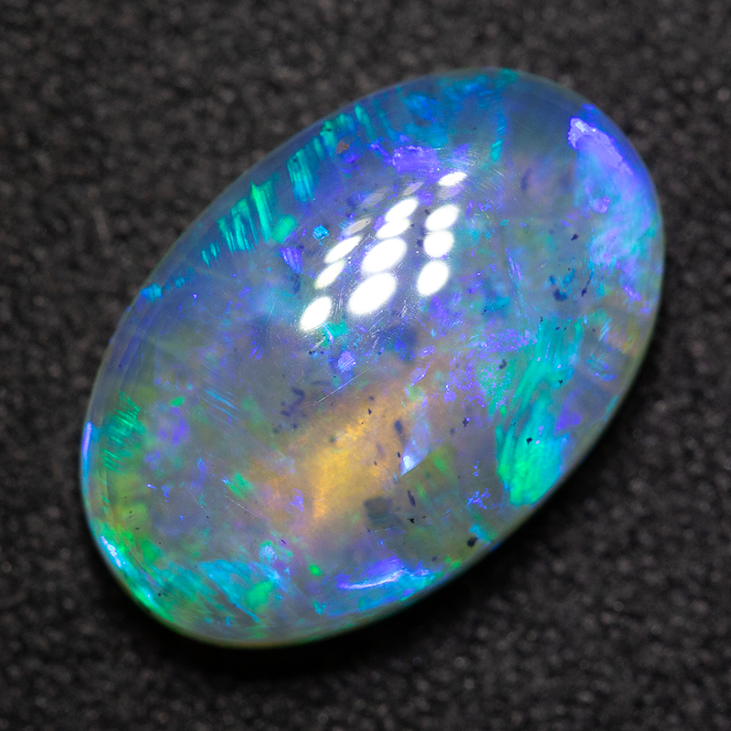 3.87 ct dark opal 13.6x8.9x4.7mm