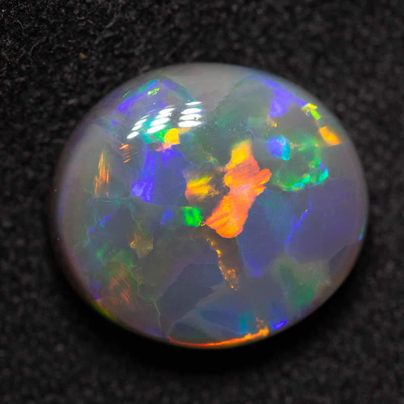 3.92 ct gem black opal 11.2x10.1x5.5mm