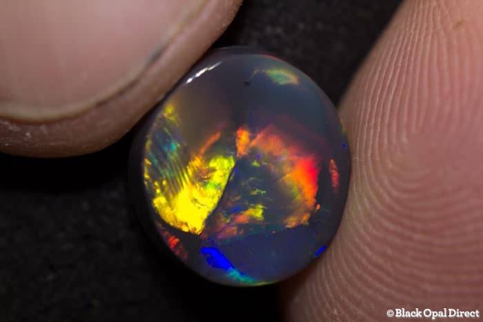 3.95 ct gem black opal 11.5x10.5x4.5mm