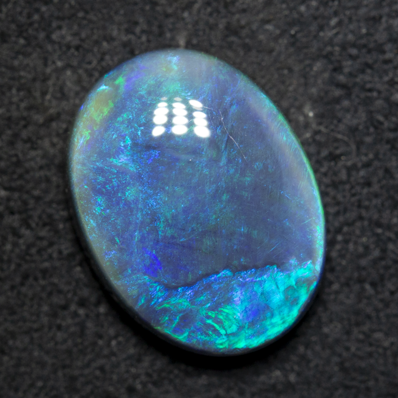 3.98 ct double-sided black opal 12.8x9.7x4.4mm