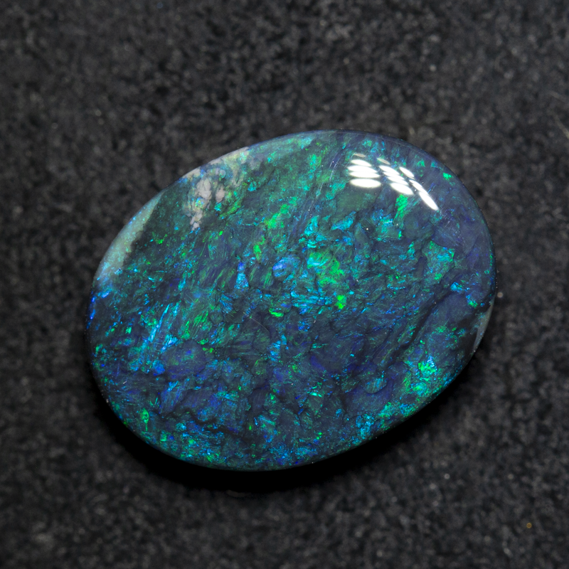 3.98 ct double-sided black opal 12.8x9.7x4.4mm