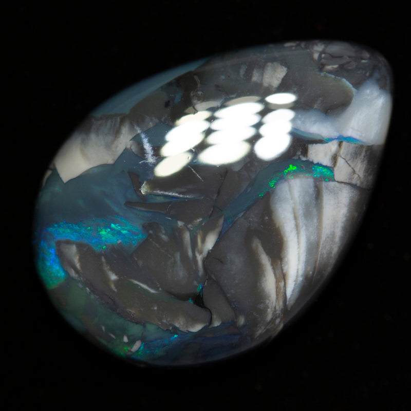 32.02 ct black opal 30x21.3x7.4mm