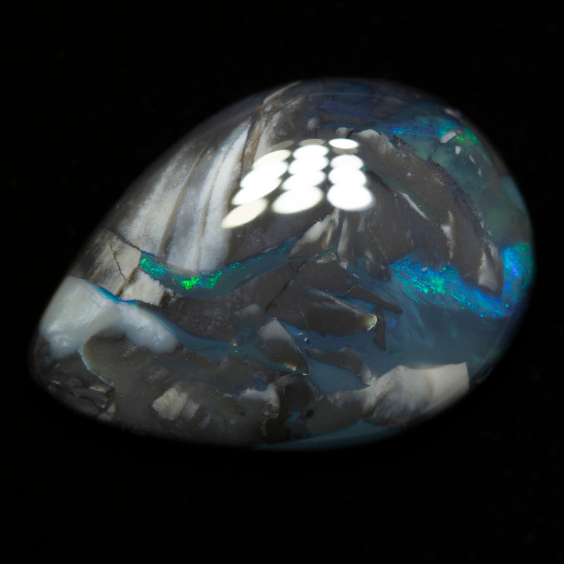 32.02 ct black opal 30x21.3x7.4mm