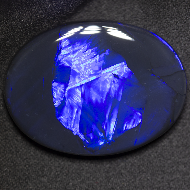 34.50 ct black opal 32x23.2x6.9mm