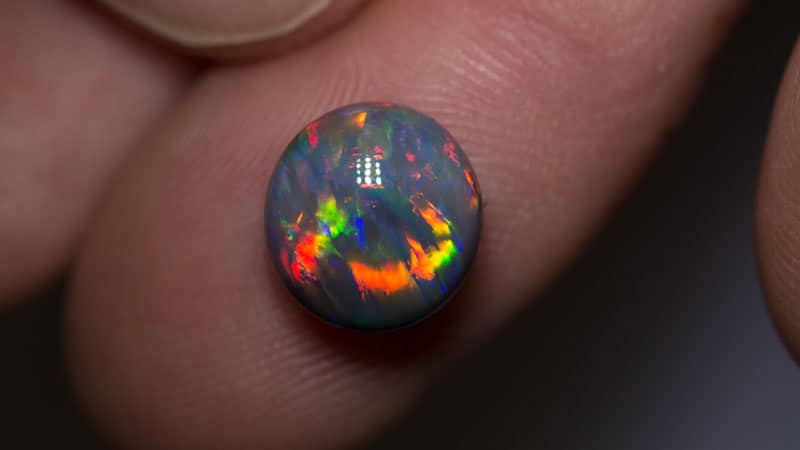 4.02ct gem black opal 10mm round x6mm