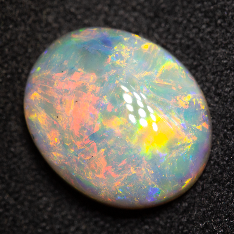 4.02 ct dark opal 12.5x10.3x4.9mm