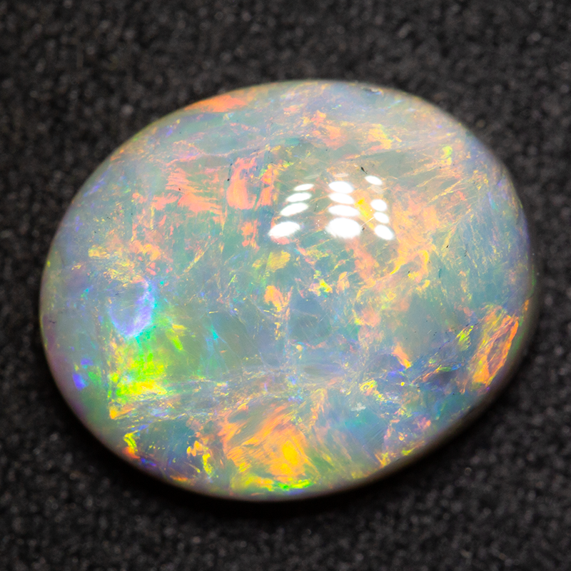 4.02 ct dark opal 12.5x10.3x4.9mm
