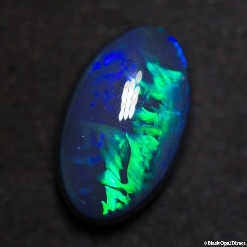DEPOSIT ONLY 4.06 ct black opal gem with Chinese writing 14x8.5x5mm