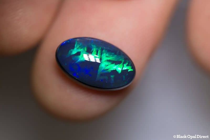 DEPOSIT ONLY 4.06 ct black opal gem with Chinese writing 14x8.5x5mm